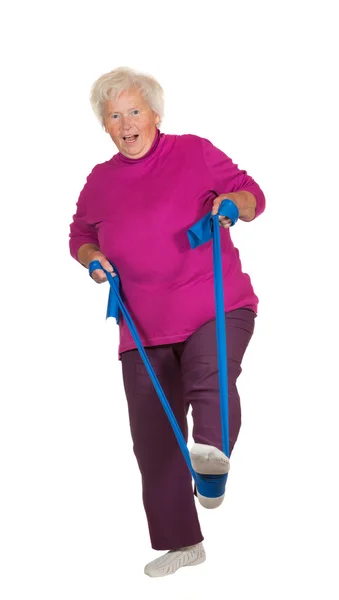 Retried senior woman exercising — Stock Photo, Image