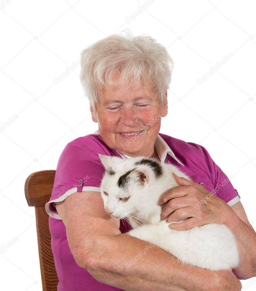 Smiling granny holding her cat