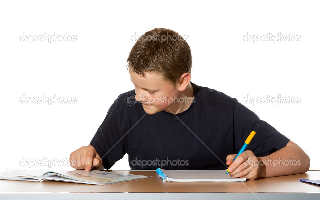 Teenage boy concentrating on his studies