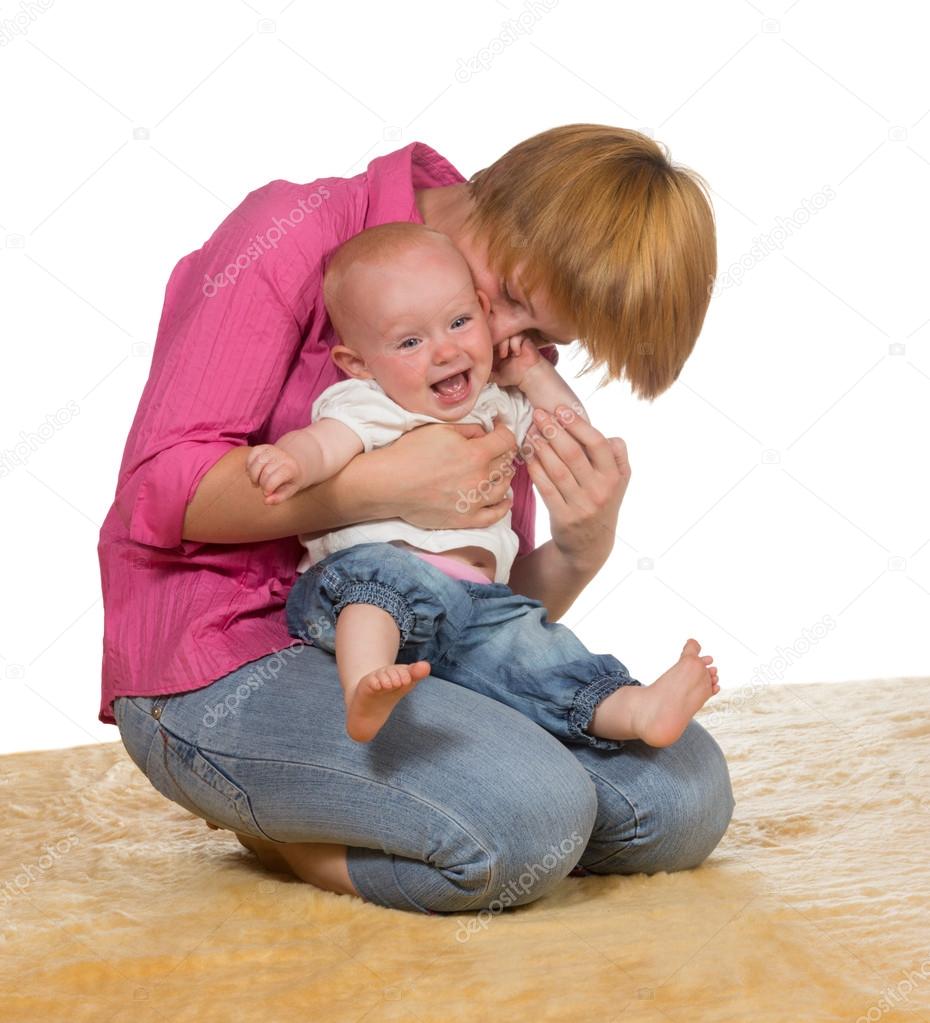 Mother with laughing baby