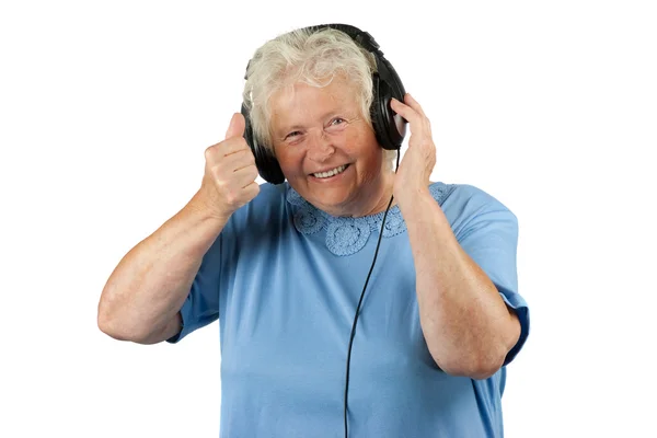 Senior woman with eraphones — Stock Photo, Image
