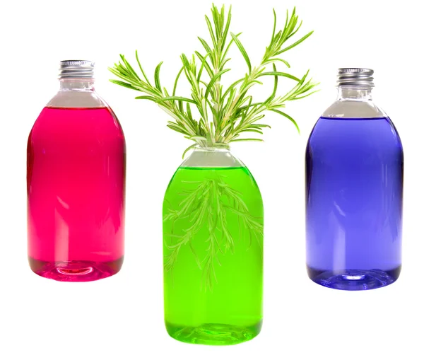 Bottiglia verde con rosmarino — Foto Stock