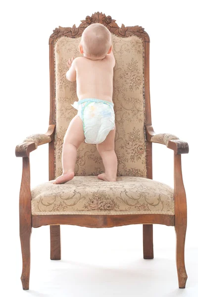 Baby boy on the antique chair — Stock Photo, Image