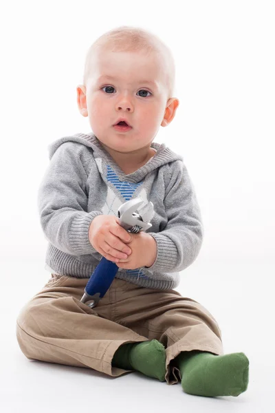 Little boy playing with the tool — Stock Photo, Image