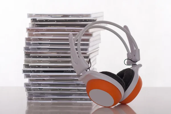 Cds and headphones Stock Photo