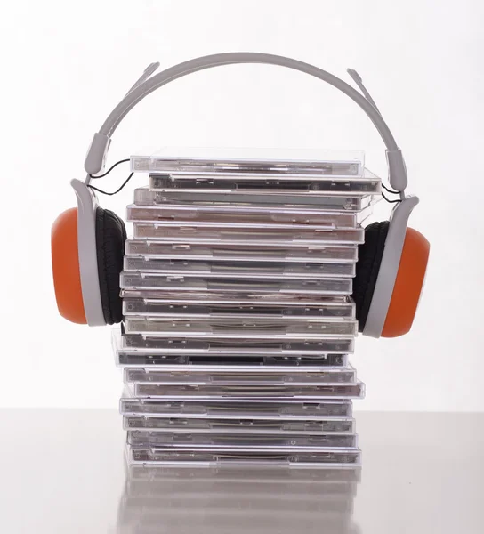 Cds and headphones Royalty Free Stock Images