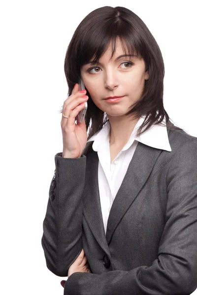 Mulher a pensar e a falar ao telefone — Fotografia de Stock