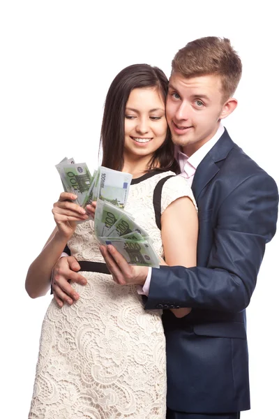 Muž a žena s penězi v rukou — Stock fotografie