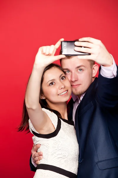 Couple photographing themselves — Stock Photo, Image