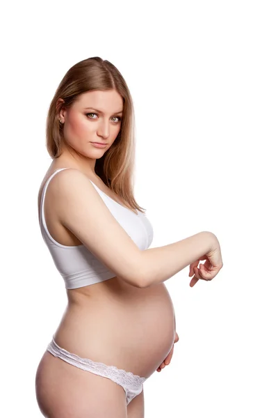 Portrait de profil de femme enceinte Image En Vente