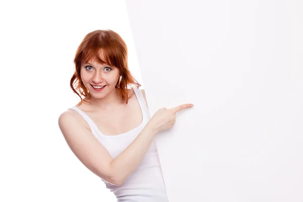 Woman holding blank billboard — Stock Photo, Image