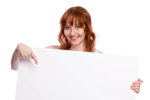 Woman holding blank billboard — Stock Photo, Image
