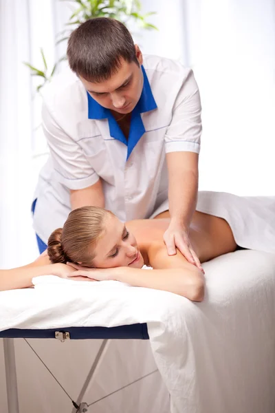 Masseur is massaging female — Stock Photo, Image