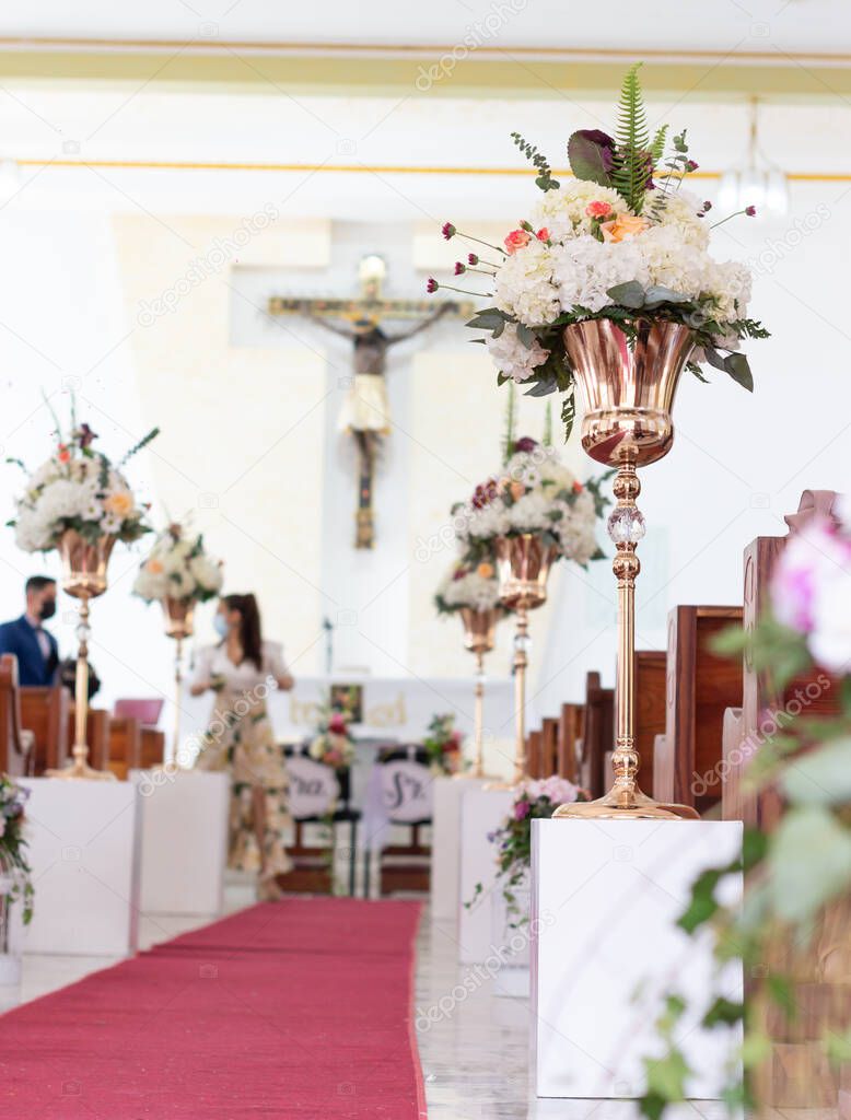 bouquet of flowers in a church with christian decoration