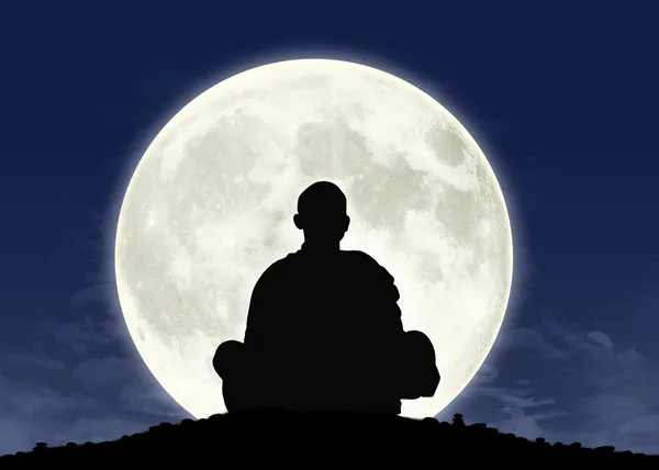 Monk in meditation at the full moon — Stock Photo, Image