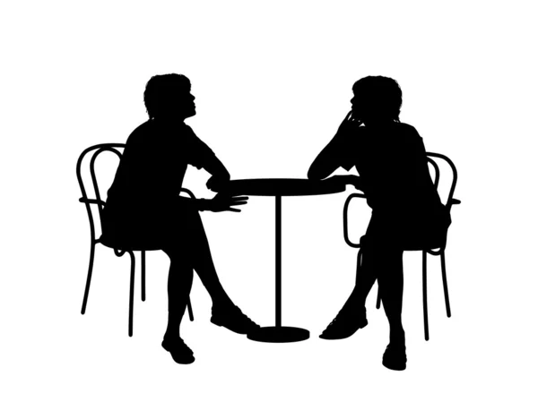 Two women sitting at the table — Stock Photo, Image