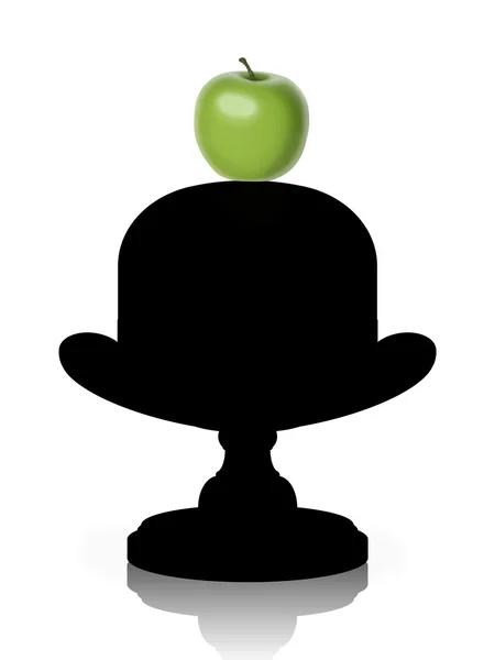 Зеленое яблоко на старомодной шляпе — стоковое фото