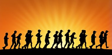 büyük bir grup günbatımı arka planda çalışan