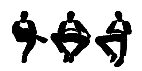 Junger mann im sessel sitzend silhouetten set 1 — Stockfoto