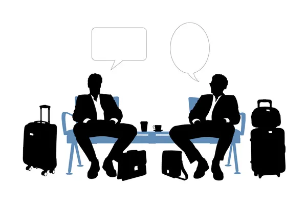 Two businessmen speaking in the airport lounge — Stock Photo, Image
