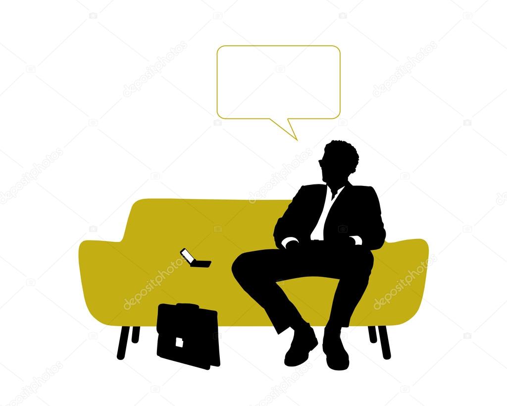 businessman seated on yellow sofa having rest and thinking
