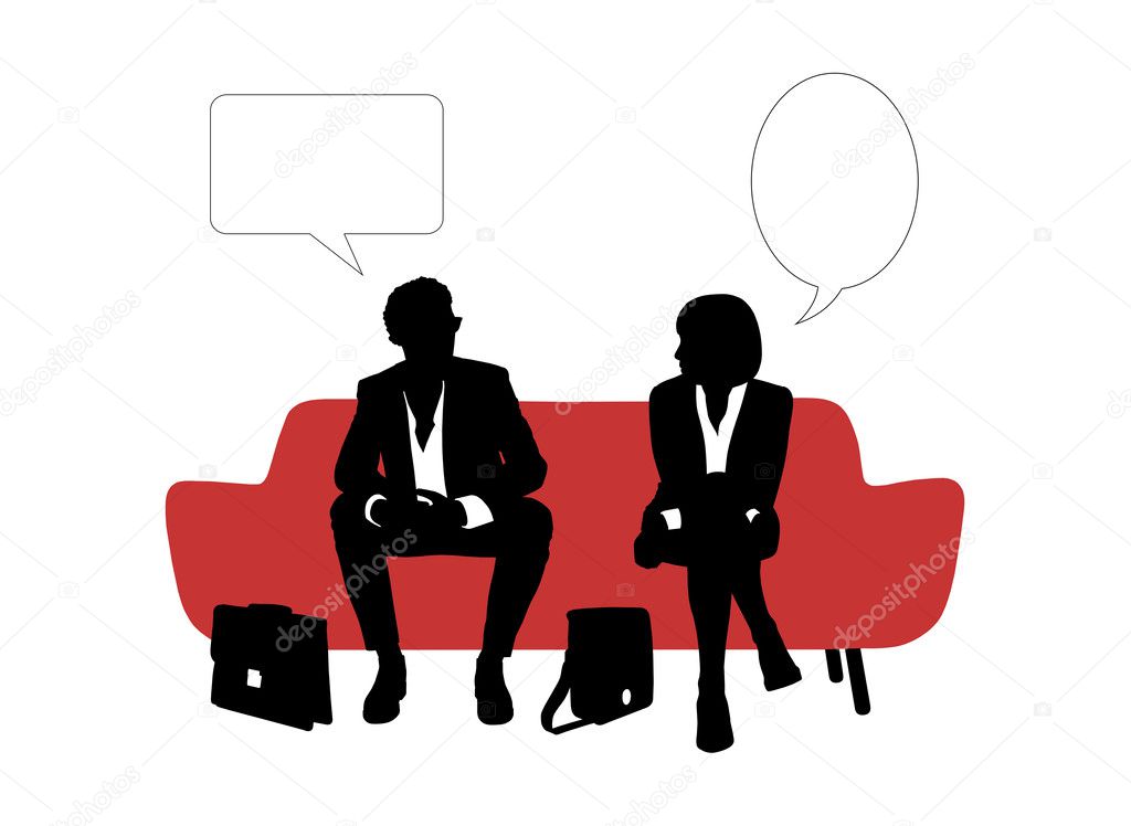 businessman and businesswoman speaking seated on red sofa