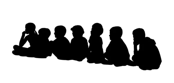 Große Gruppe von Kindern sitzende Silhouetten 2 — Stockfoto