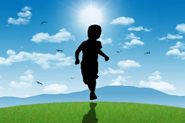Little boy running towards shining sun — Stock Photo, Image