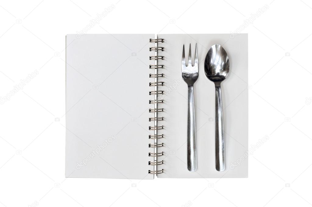 Blank notepad with fork and spoon on white