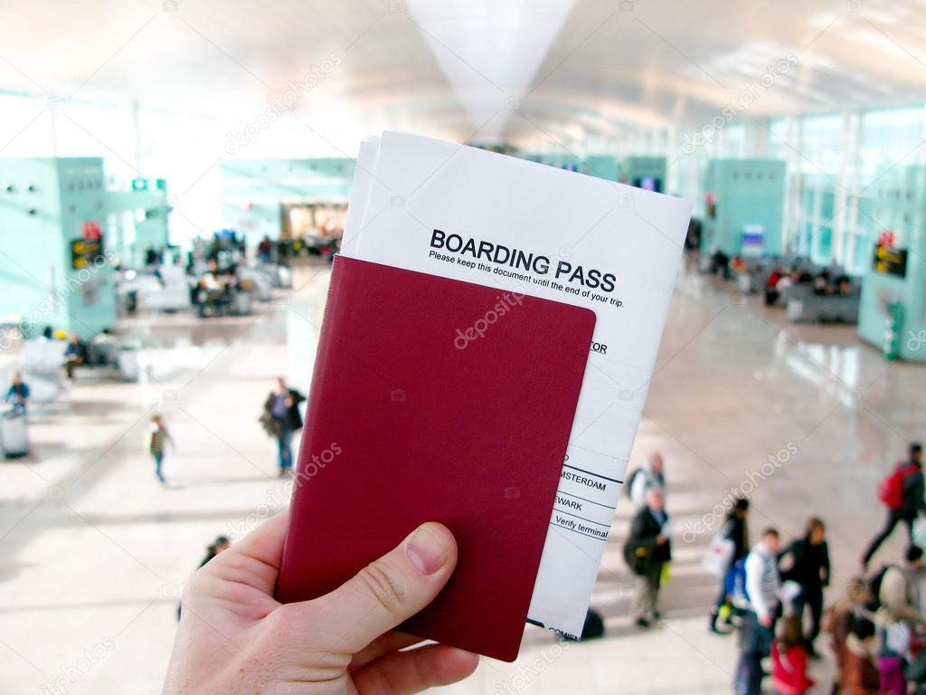 Passport and boarding pass, waiting for a flight in a modern air