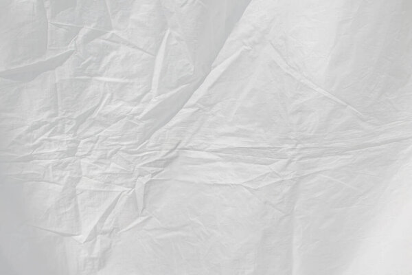Abstract wrinkled white surface sheet material background backdr
