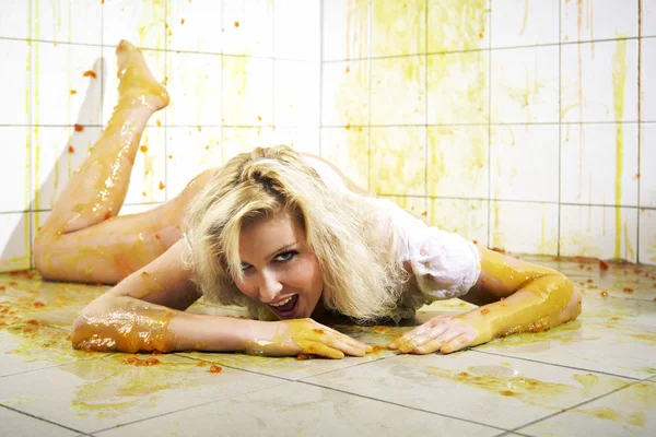 Young woman playing with melted Jelly — Stock Photo, Image