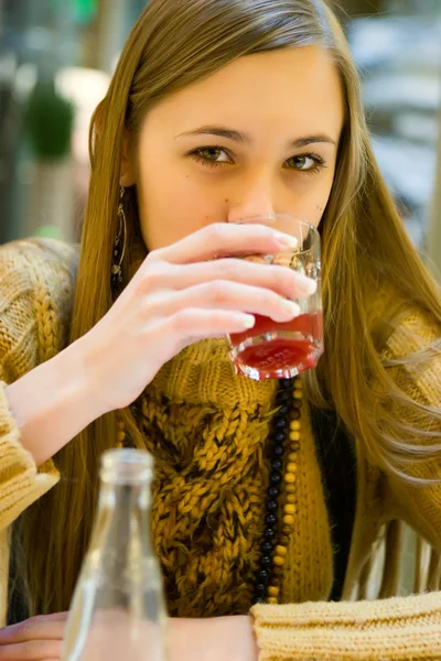 Lady drinking juice — Stock Photo, Image