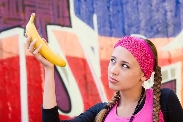Young woman with banana — Stock Photo, Image