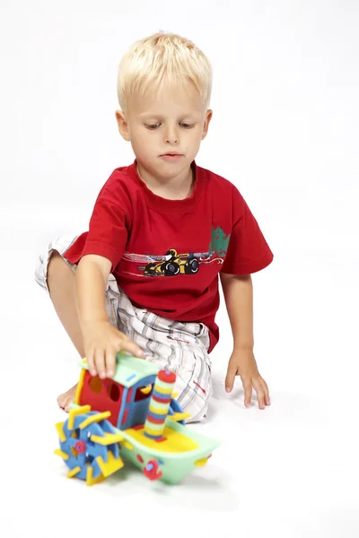 Children at play with color foam toys — Stock Photo, Image