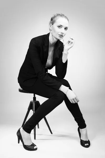 Lady model sitting on chair — Stock Photo, Image