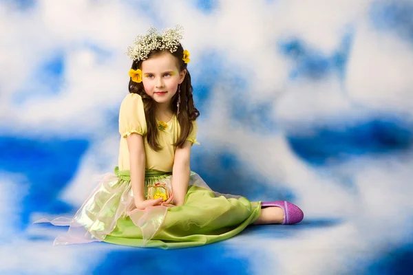 Princess - little girl sitting on background in studio — Stock Photo, Image