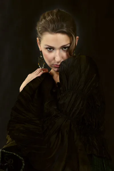 Woman posing in studio in styling of gothic girl — Stock Photo, Image