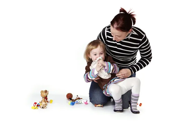 Little girl in studio playing with her mother — Stock Photo, Image
