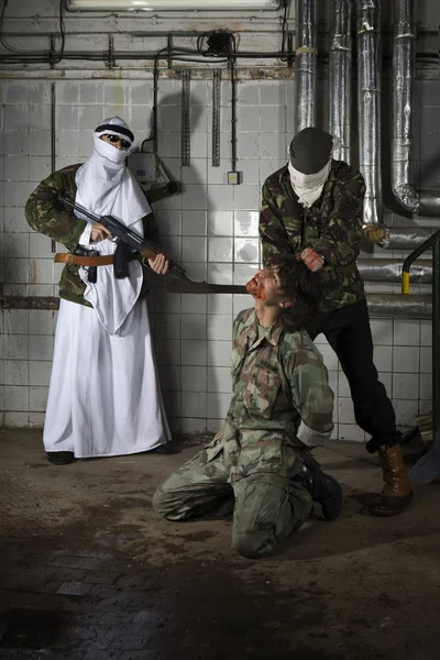 Радикалы пытают и убивают американских солдат — стоковое фото