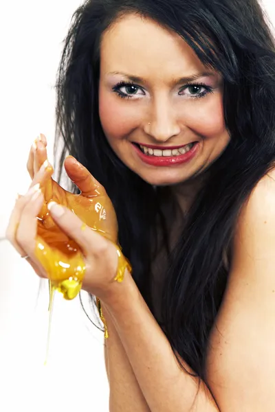 Young woman playing with melted Jelly — Stock Photo, Image
