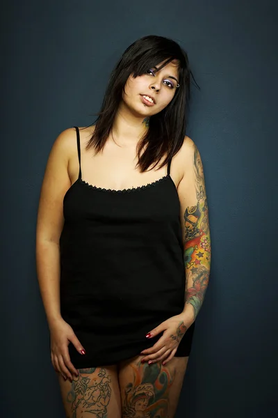 Woman with many tattoo arts on her body — Stock Photo, Image