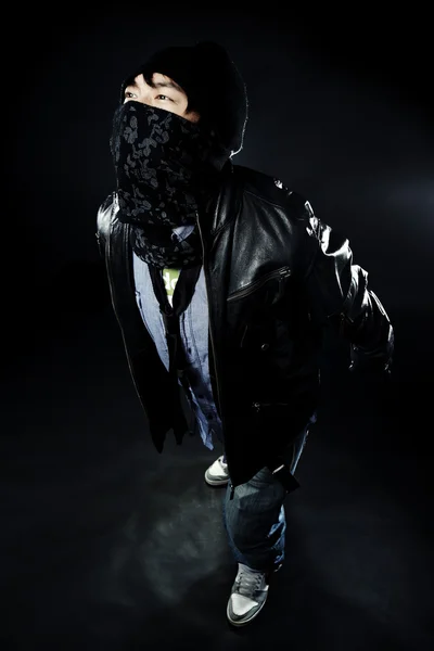 Young Asian man posing in studio — Stock Photo, Image