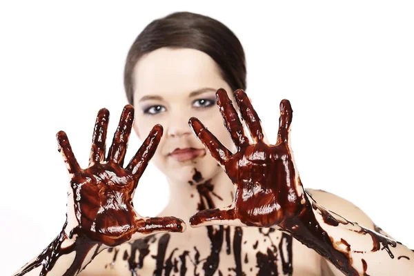 Kobieta degustacja płynnej czekolady — Zdjęcie stockowe