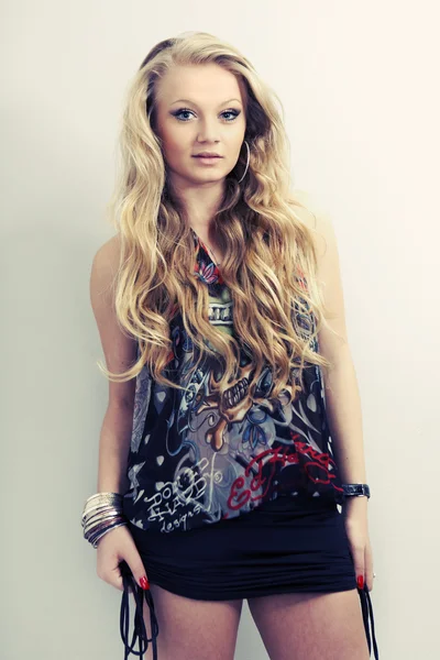 Young blonde lady posing in studio — Stock Photo, Image