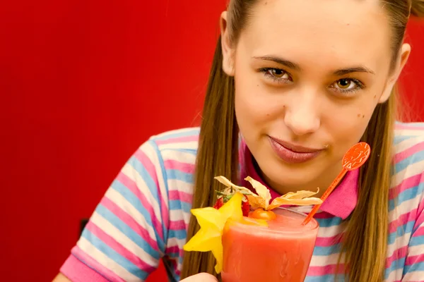 Girl drinks fruit juice — Stock Photo, Image