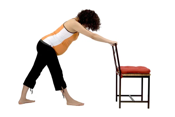 Schwangere junge Frau übt Yoga-Balance — Stockfoto