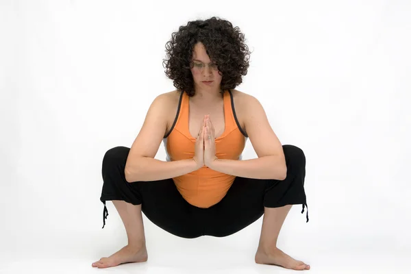 Pregnant young woman exercising yoga balance — Stock Photo, Image