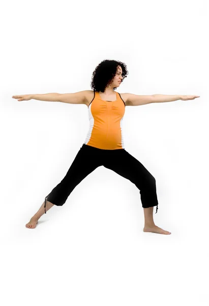 Mujer joven embarazada haciendo ejercicio de equilibrio de yoga —  Fotos de Stock