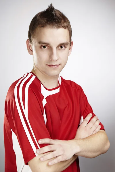 Soccer player in studio — Stock Photo, Image